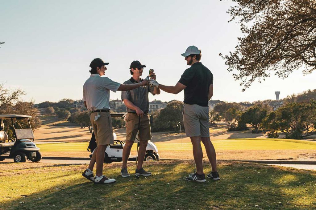 players connecting on the fairway